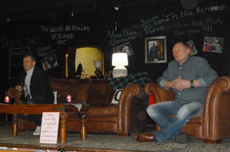 ​Nigel Owens and Charlie Watts on stage