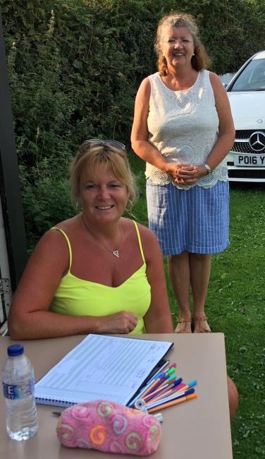Scorers Diane Brown and Joy James