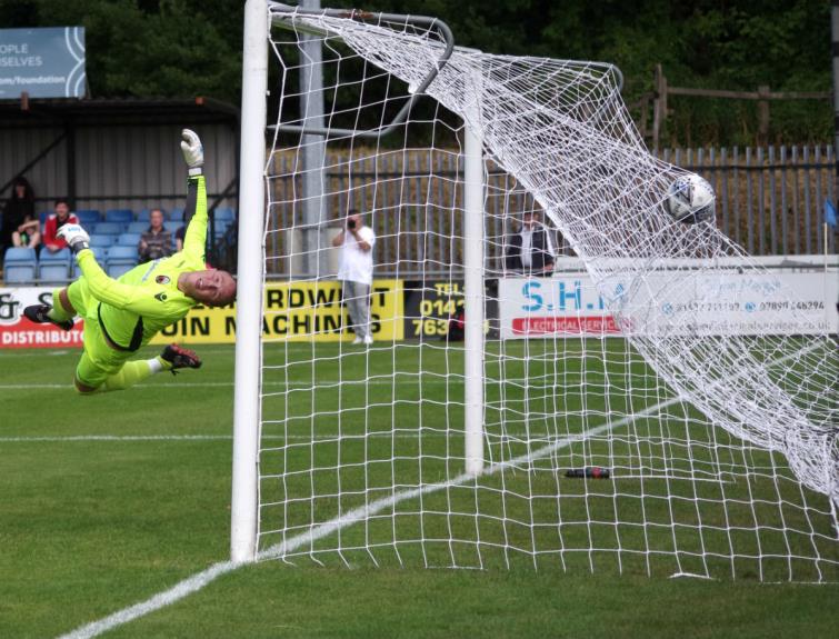 Treflin goalkeeper Mathew Stanton well beaten by Elliot Scotcher’s stunning free kick