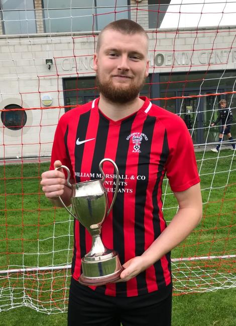 Scott Delaney with the cup