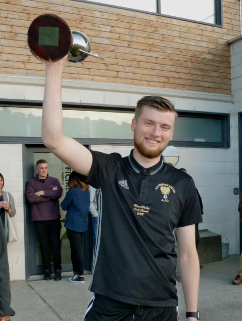 Scott Delaney holds the cup aloft