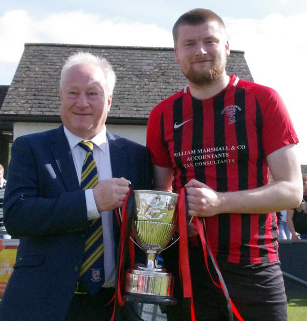 League Council Steve Briers presents Senior Cup to Goodwick skipper Scott Delaney