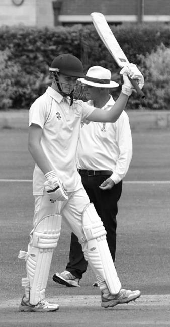 Seth Willington celebrates a good knock