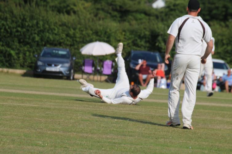 Sean Hannon takes a tumbling return catch