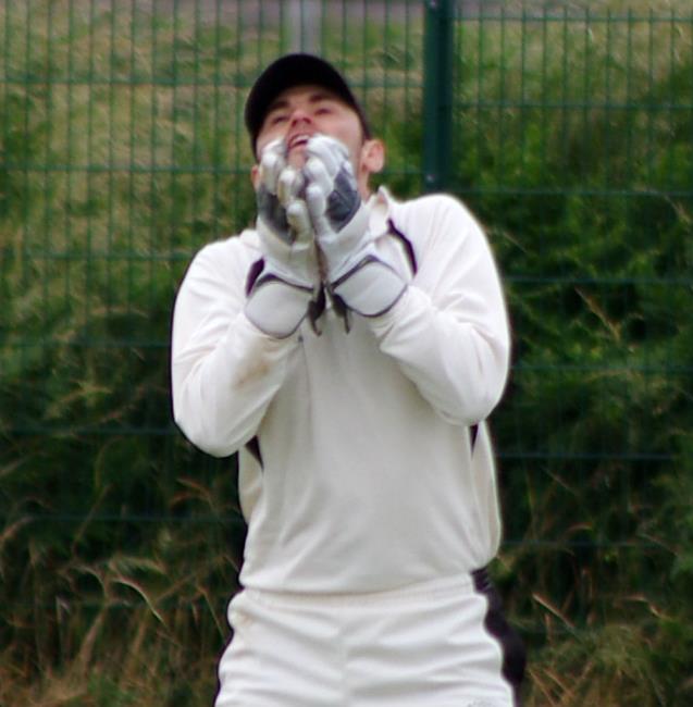 Neyland wicket keeper Sean Hannon takes a catch to dismiss Town skipper Danny Potter