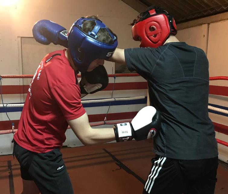 Sean throws a right hook in training