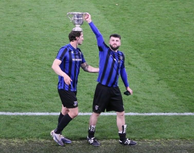 Shane Walsh and Mark Jones with the silverware. Picture Tim Phillips