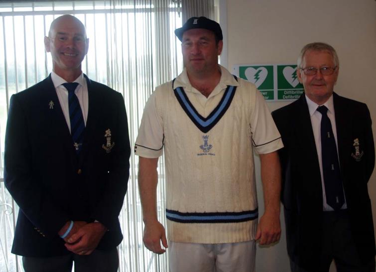 Simon Holliday (centre) awarded a PCCC Cap by officials Paul Webb (left) and Nick Evans (right)