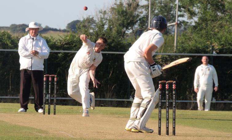 Sion Jenkins bowls well for Carew