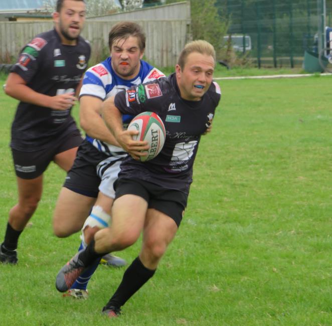 Sion Jenkins tackles Gareth Rees