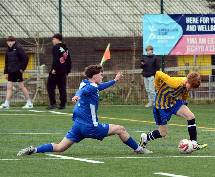 16 year old George Morgan breaks down the left for Kilgetty against Merlins Bridge