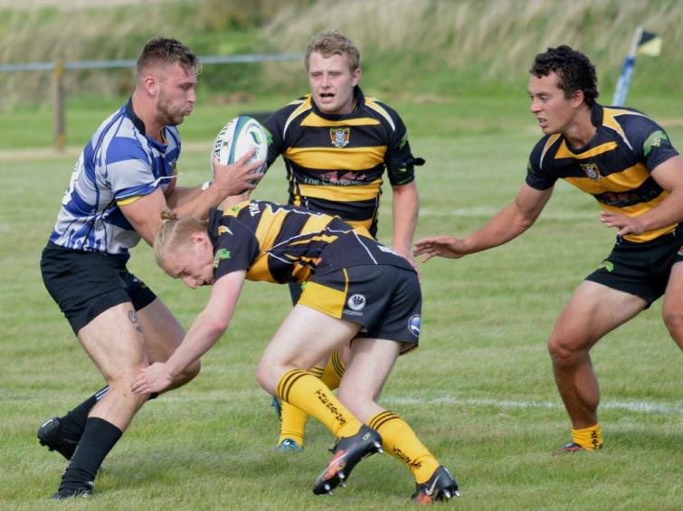 Josh Hicks battles hard for Llangwm (Ceri Coleman-Phillips)