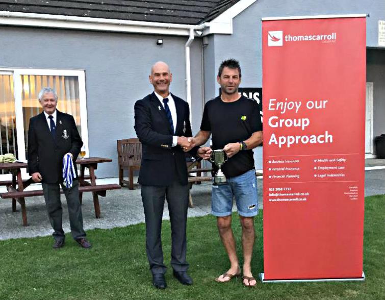 St Ishmaels 2nds skipper Robbie Thomas receives the silverware