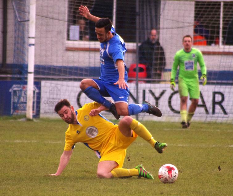 Antonio Facciuto avoids a heavy tackle