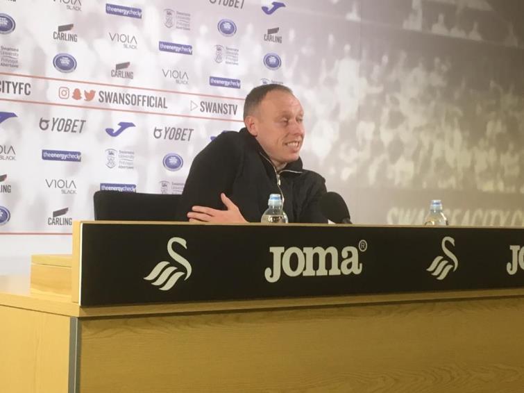 Swansea City manager Steve Cooper talks to the press