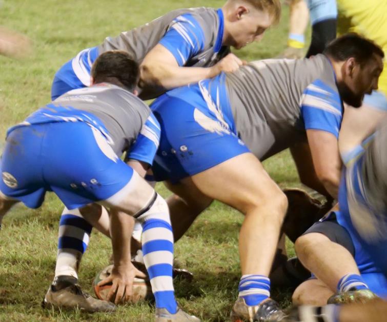 Lee Summons looks to get the ball away