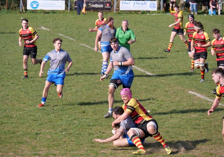 Craig Barnett is tackled high against Cardigan. Picture William John