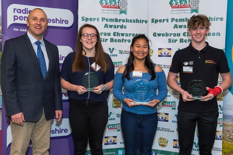 Student Contribution to School Sport - Winner Nina Garcia (Greenhill School) is pictured with Simon Roach from Strength Academy Wales. The finalists were William Wright (Pembroke School) and Carys Davies (Greenhill School).