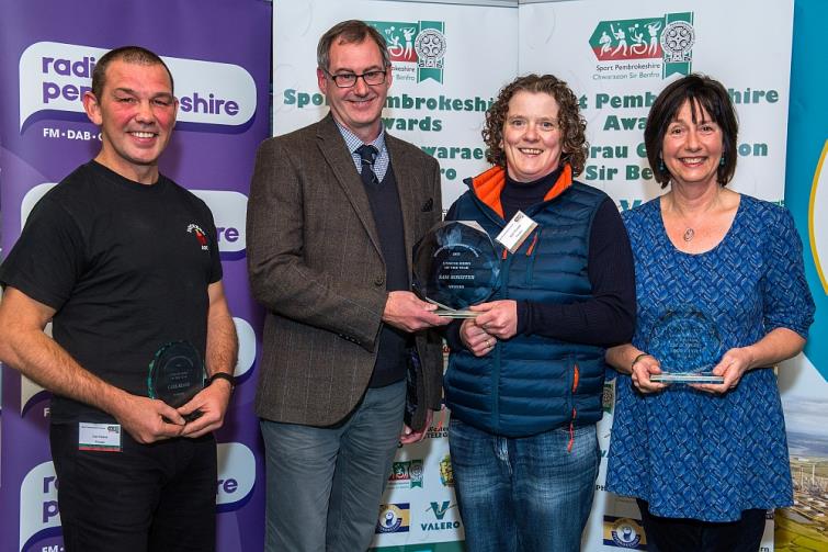Unsung Hero - Winner Sam Rossiter (Cricket) is presented with her award by the Western Telegraph’s Gordon Thomas. The finalists were Carl Keane (Boxing) and Liz and Nigel Rowland (Athletics).