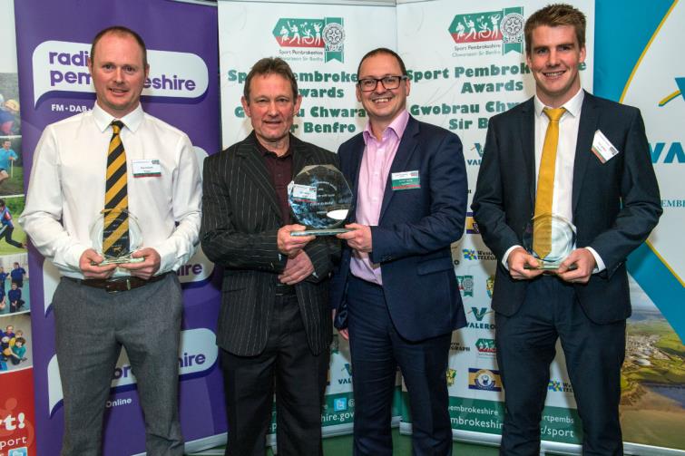 Coach of the Year - winner Chris Barker (Squash), with his award, presented by Sport Wales Carwyn Young. The finalists were Sion Jenkins (Triathlon) and Rob Williams (Cricket)