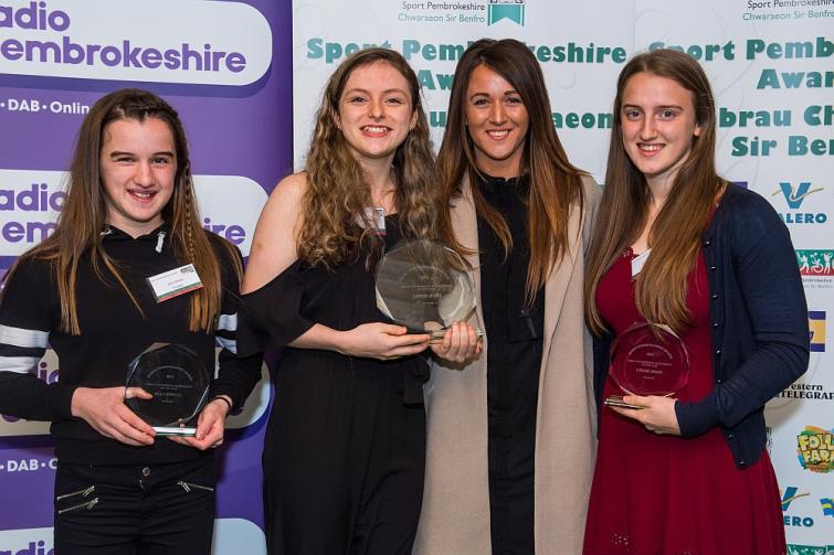 Girls U16 Sporting Achievement  Winner Lowri Hart (Badminton) receives her award from Radio Pembrokeshires Nia Thomas. The finalists were Chloe Hood (Weightlifting) and Ella Wintle (Athletics).