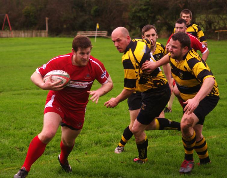 Pembroke centre Dom Colman on the burst at Pill Parks
