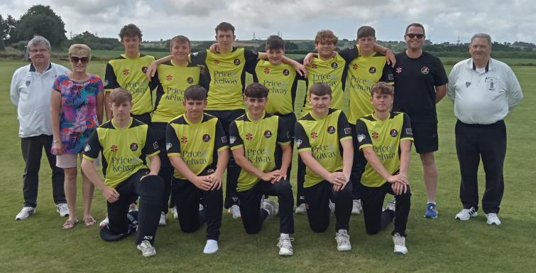 The County youth team with umpires Gareth Brace and Chris Stapleton, plus sponsors Wendy and Aled Davies 