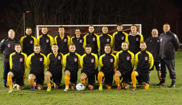 The Pembrokeshire squad line up before kick off with new kit provided by Manderwood