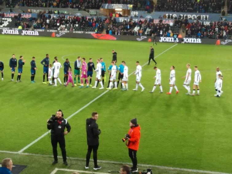 Players greet at start