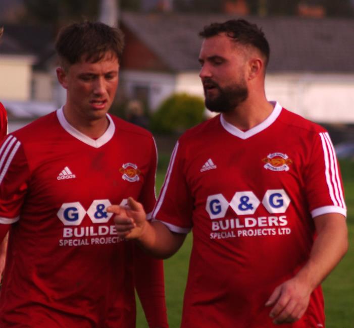 West Dragons goal scorers Daniel Bryce and Ashley Prior are in deep discussion