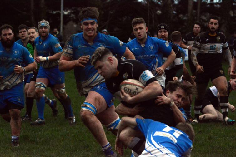 Quins skipper Harry Owen on a typical charge