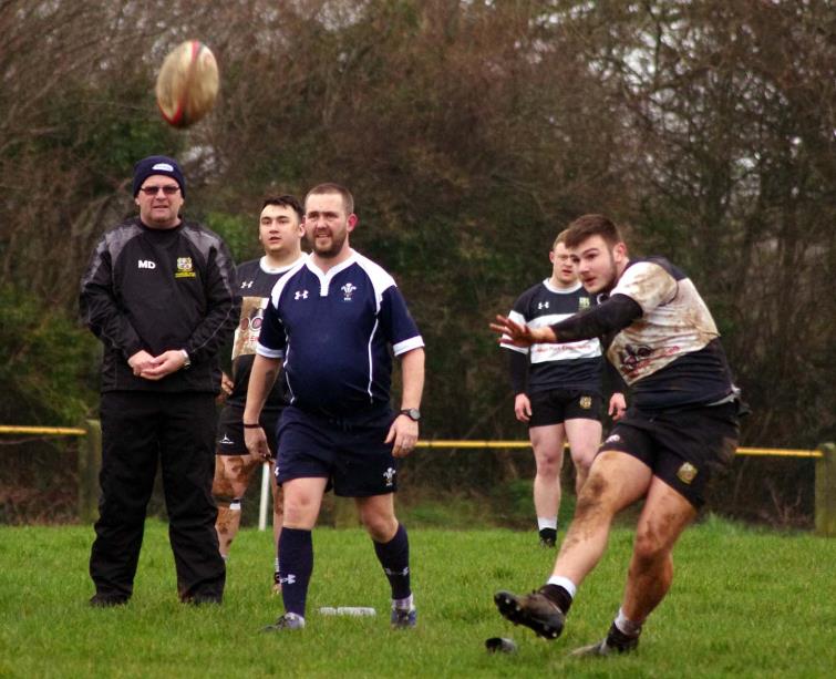 Outside half Ben Hathaway kicks an early penalty for The Quins