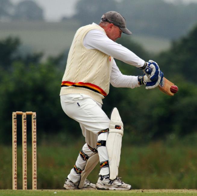 Robbie Hicks smashes a boundary for Carew Seconds