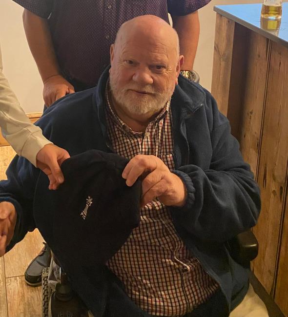 Reg presents Charlie Malloy his county cap