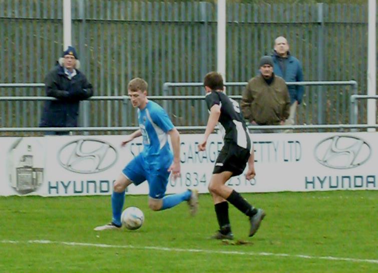Rhys Dalling takes on the Risca defence