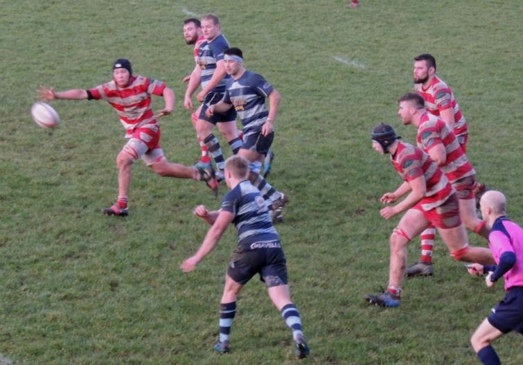 Rhys Lane gets his backs in motion