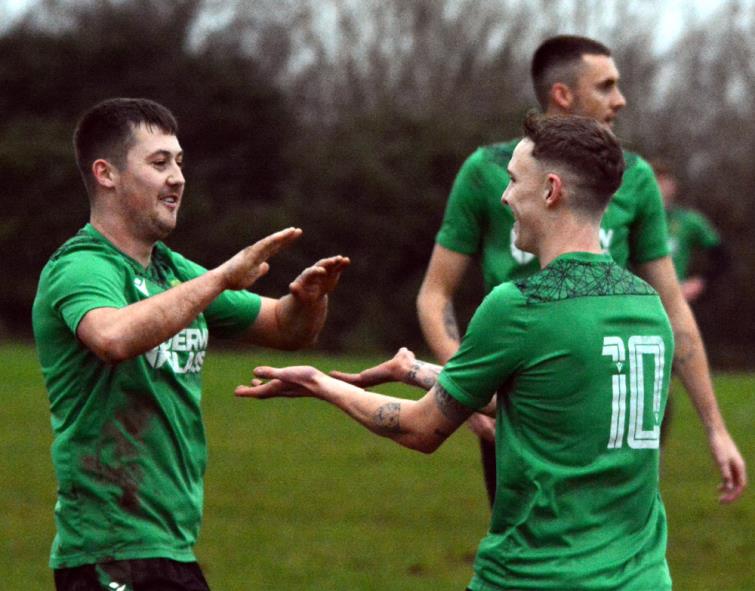 Goodwick goal scorers goal scorers Rhys Jones and Will Haworth celebrate