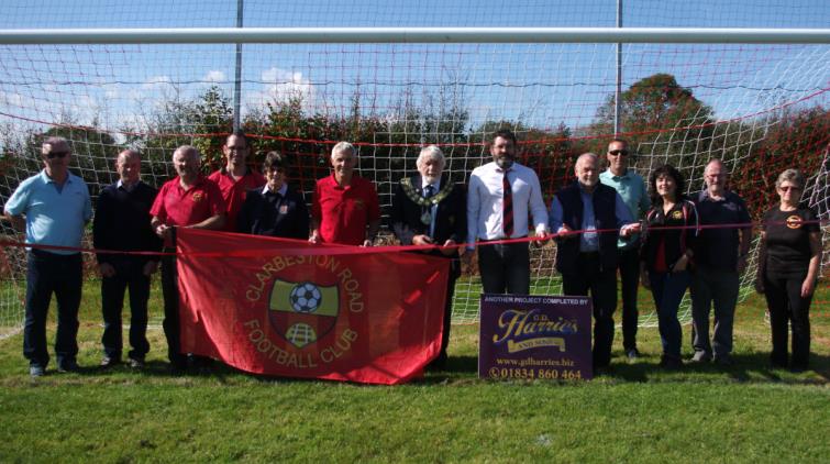 West Wales Football Association Chairman Roger Wood cuts the ribbon