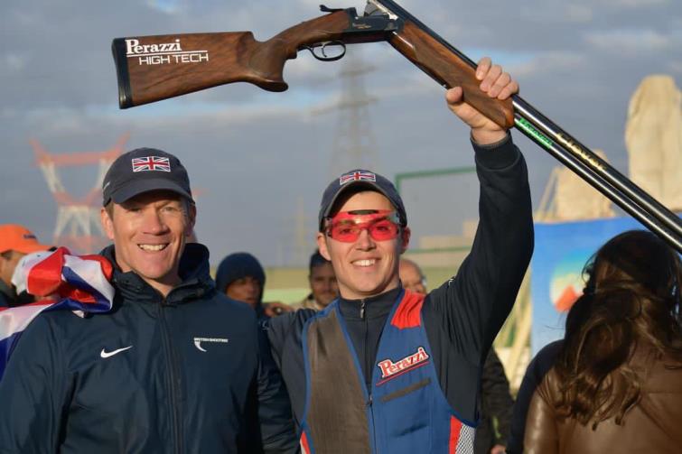 Richard Brickell and Ben Llewellin who holds his gun aloft