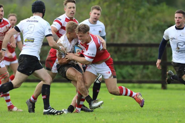 Milford centre Dan Jenkins is stopped in midfield. Pic Riley Sports Photography