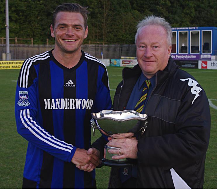 Skipper Nicky Woodrow receives the Jubilee Bowl