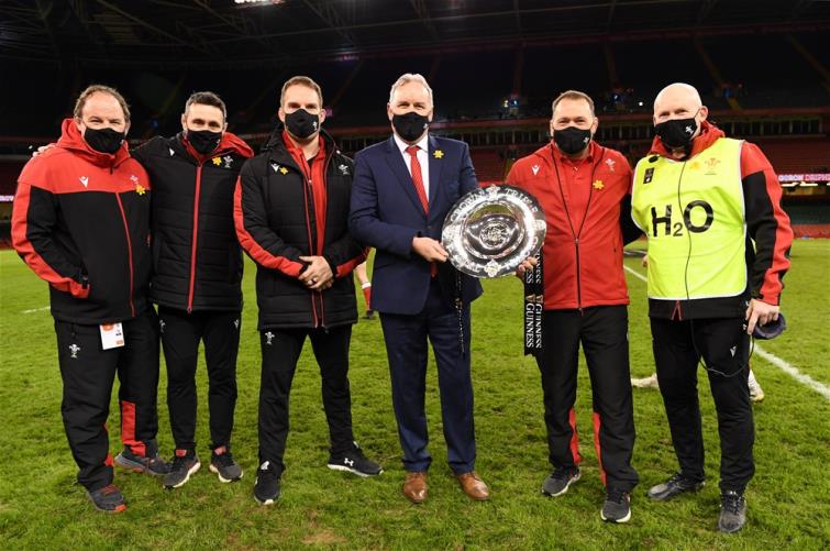 Wayne Pivac celebrates Triple Crown with his coaches