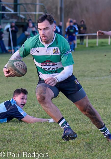 Liam Price makes a break for Whitland. Picture Paul Rodgers