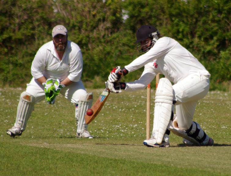 Jake Wicks smashes a boundary on his way to 136 not out for Hook