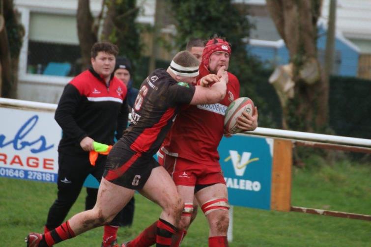 Will Edwards takes a big tackle for Pembroke 