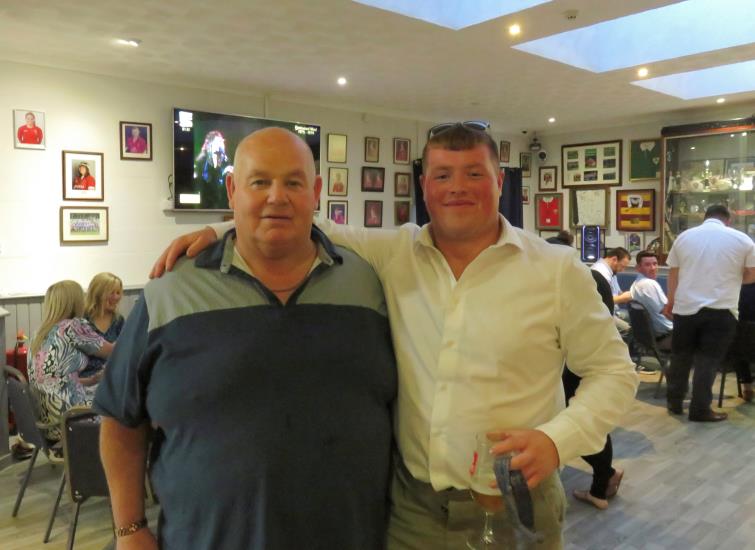 William shares a pint with grandson Thomas Carrington