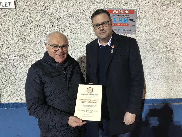 Barry Vaughan (Supporters Club chairman) and Rob Edwards (Haverfordwest County chairman) with their certificate