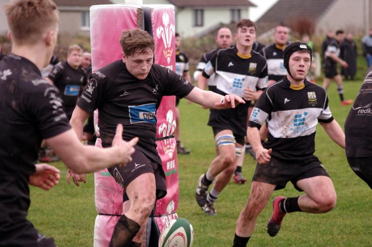 Toby Hayman clears the danger for Neyland