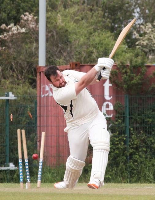 Tom Arthur skittles the stumps of former team mate Brad McDermott Jenkins. Picture Susan McKehon