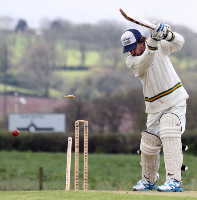 Tom Davies takes one of his  wickets